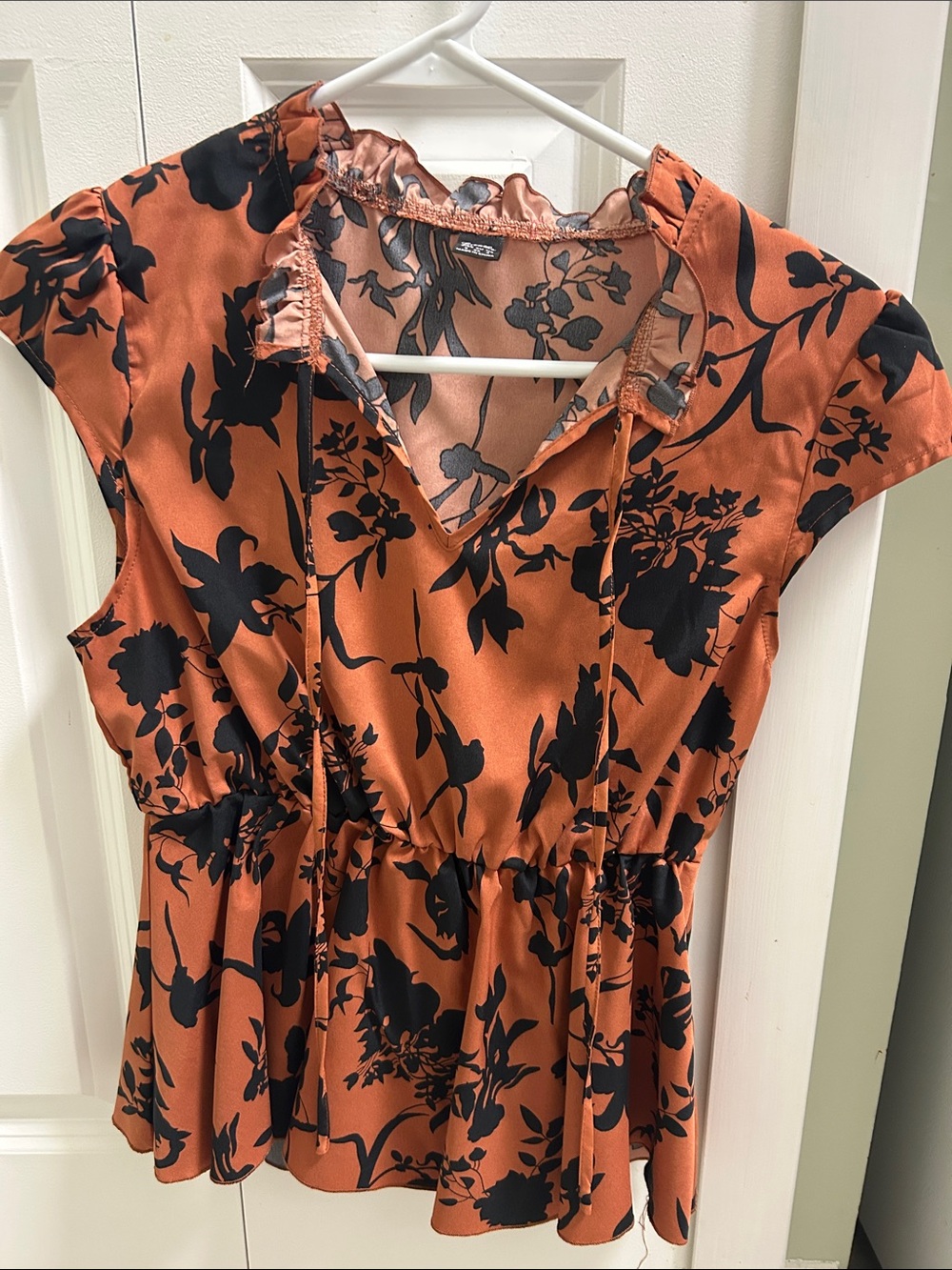 Rust Orange Floral Peplum Top with Black Print